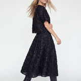 Reya paljettihame, Black