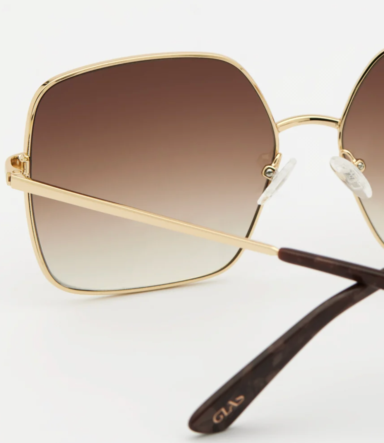 Billie gold aurinkolasit
